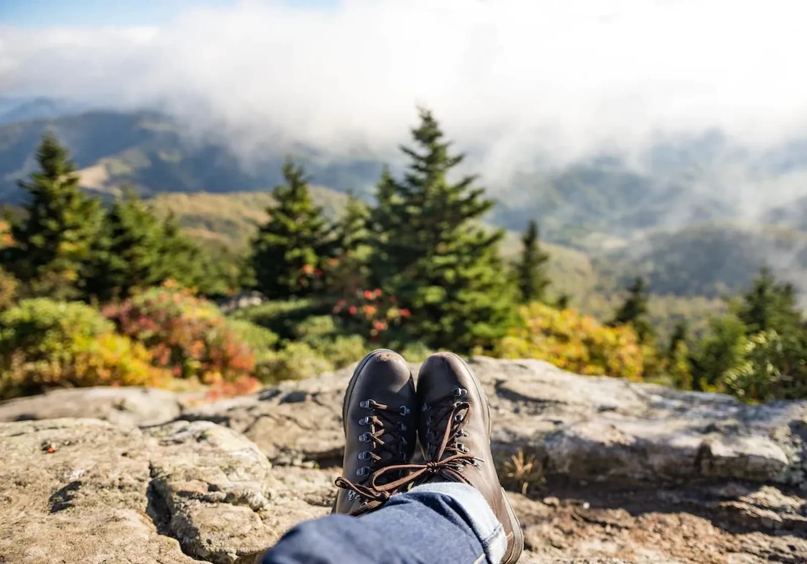 Image of a pair of hiking boots resting on a mountain in Sweden.